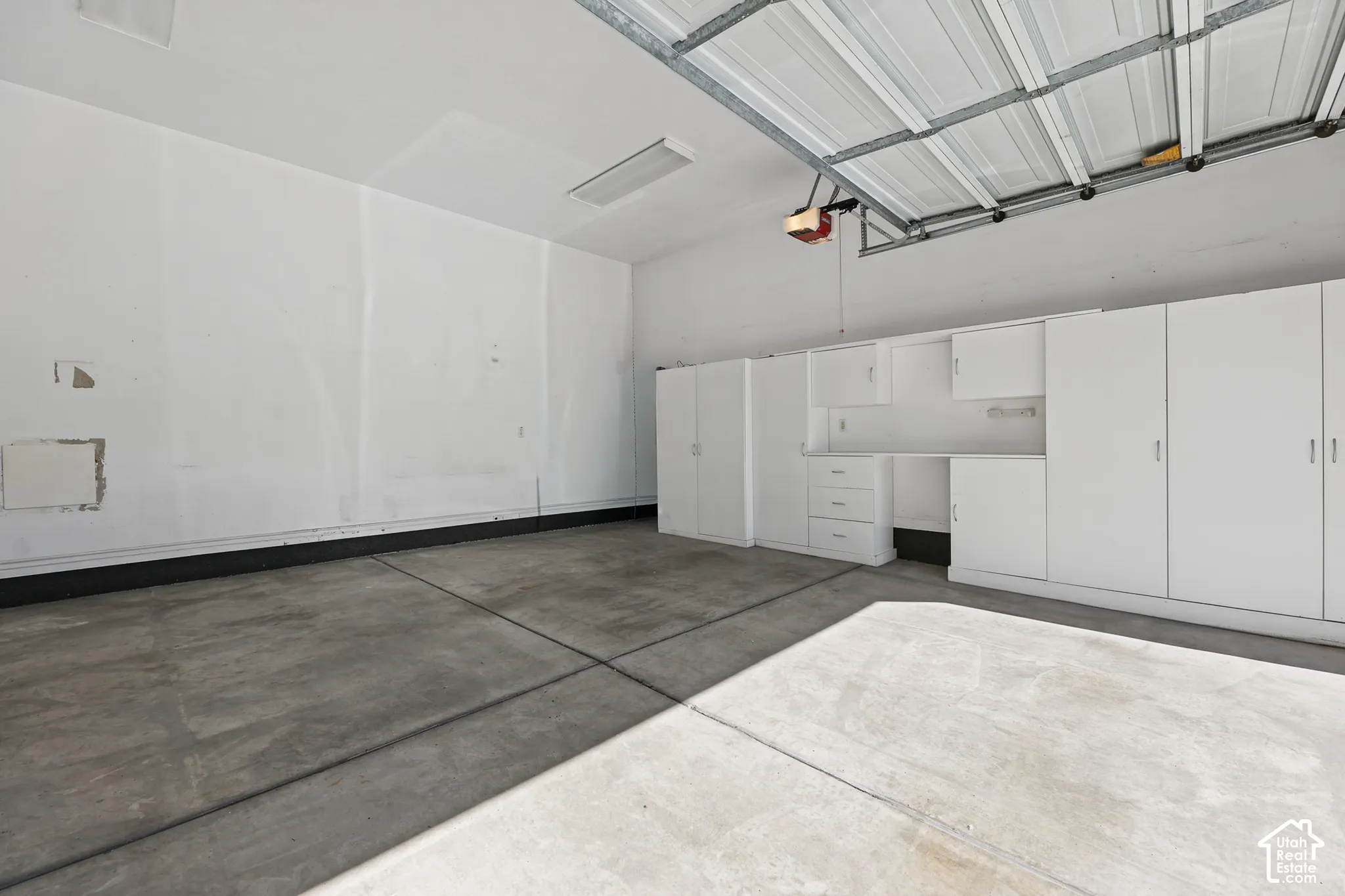 GARAGE WTIH INCLUDED STORAGE CABINETS