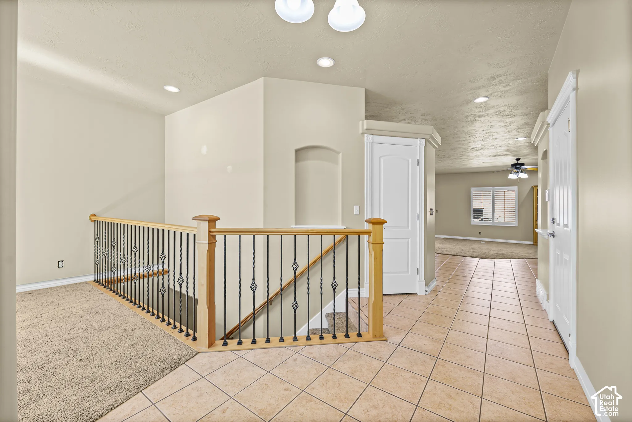 HALLWAY AT ENTRY OF GARAGE AND FRONT DOOR