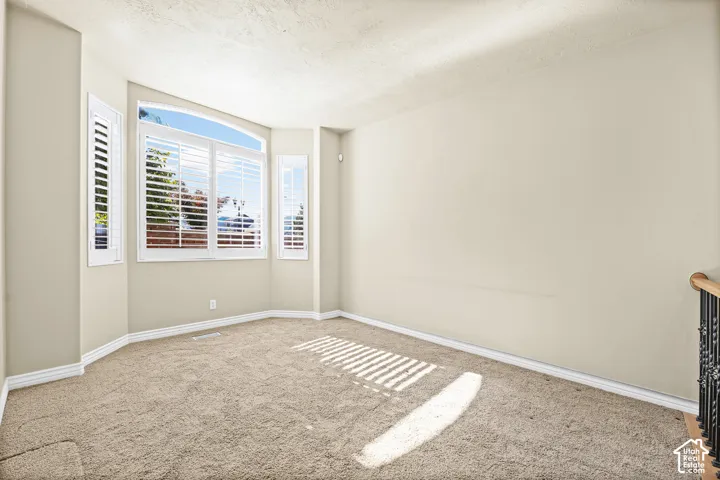 FORMAL LIVING ROOM WITH NATURAL LIGHT