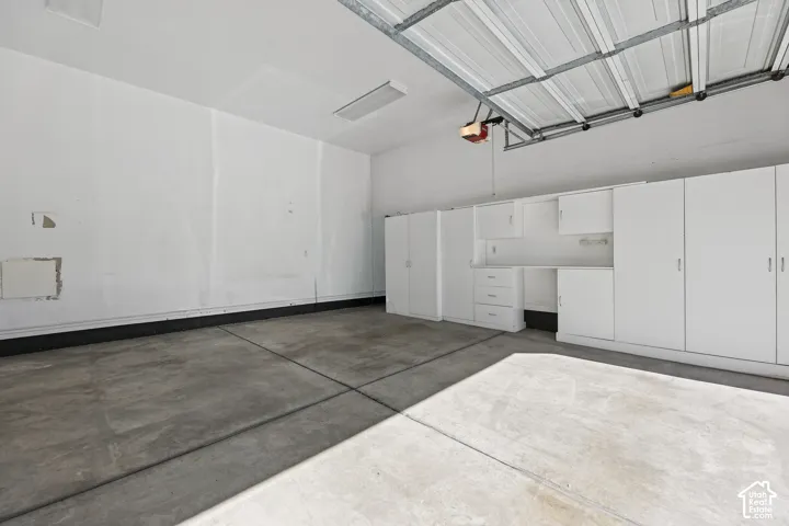 GARAGE WTIH INCLUDED STORAGE CABINETS