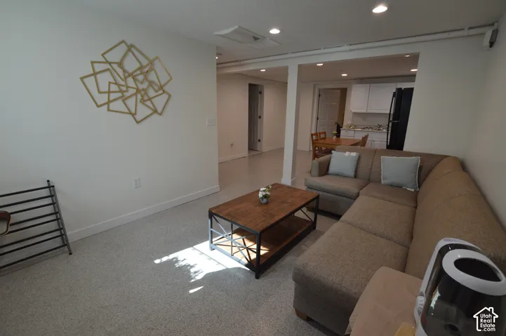 Apt 3. 778 SF. Recessed lighting, neutral wall paint.