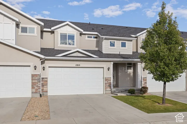 Exterior facade featuring a two-car garage