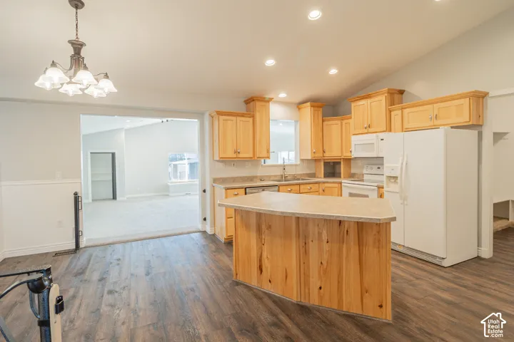 Kitchen featuring light-finish cabinetry, a central island, wood-finish flooring, recessed lighting, and a multi-light chandelier
