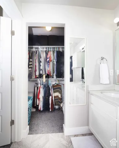 Primary bathroom walk-in closet