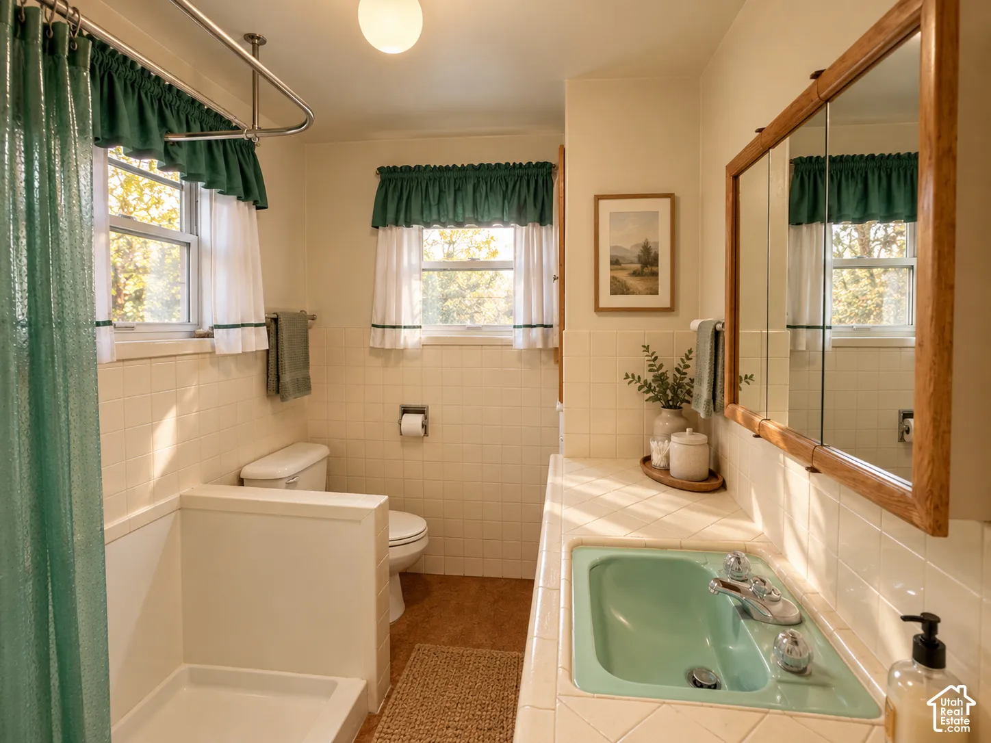 Bathroom featuring tile wall surfacing, a vintage-style inset vanity sink, wood-framed medicine cabinet, and a walk-in shower enclosure