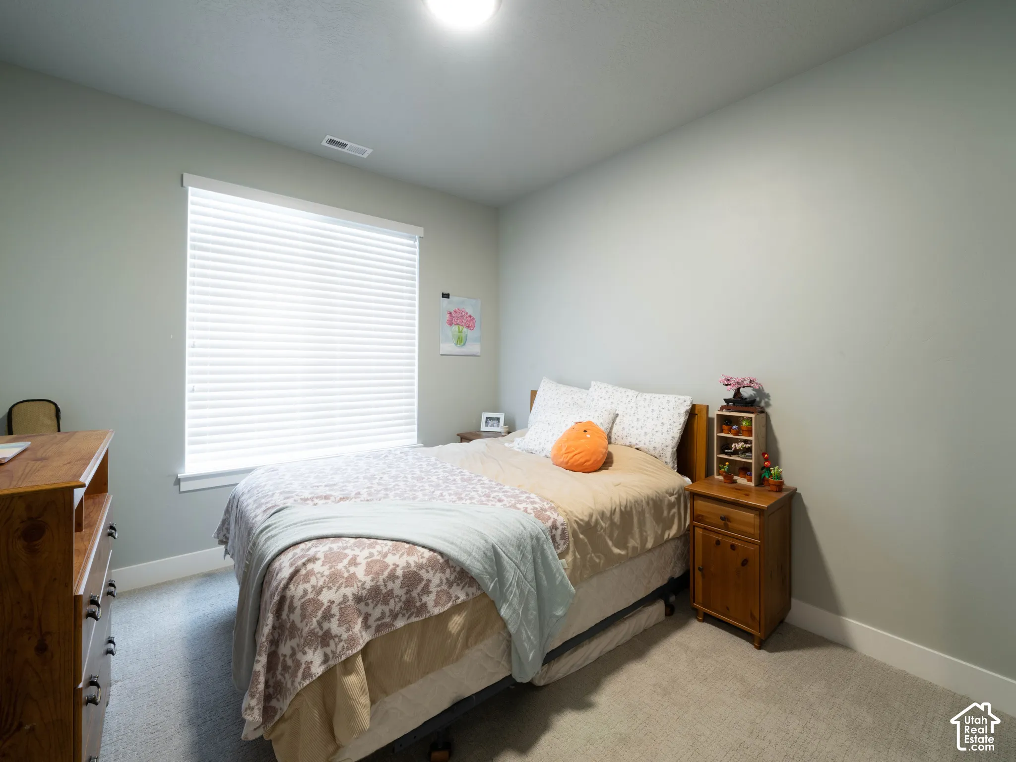Recessed lighting, light gray wall finish, carpet flooring, window with blinds, and white trim