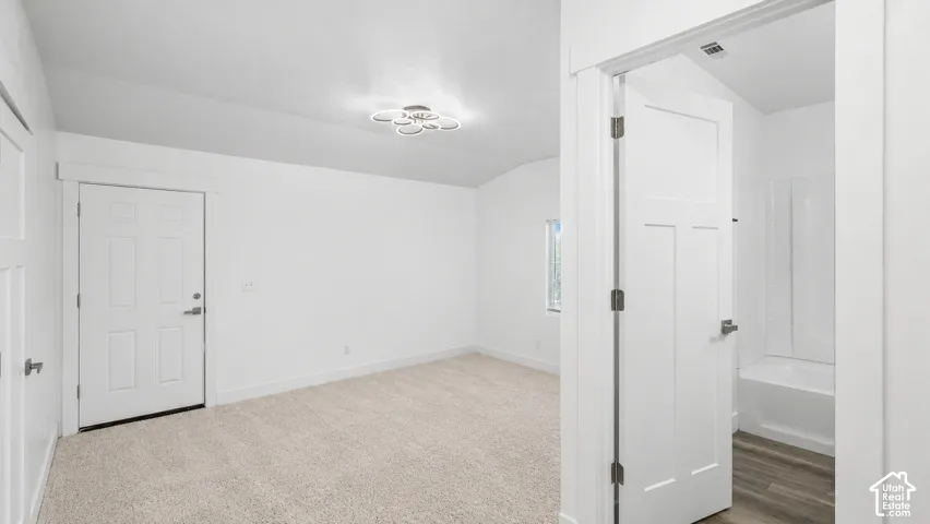 Main bedroom. Digitally altered to show the new carpet.