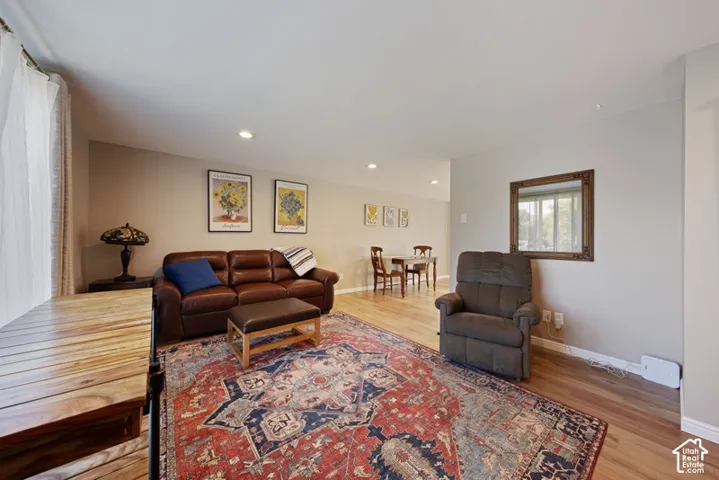 Interior space featuring wood-finish flooring and recessed lighting