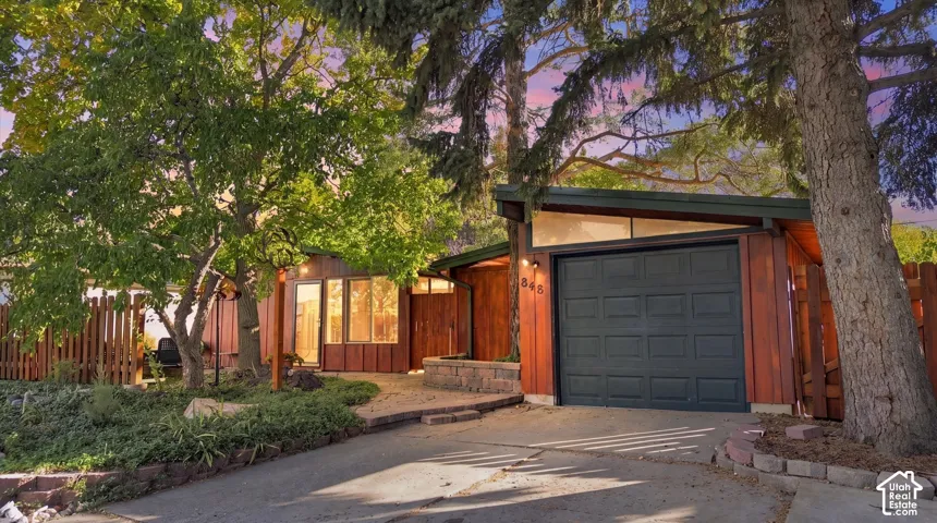 Mid-century modern exterior featuring cement board siding.