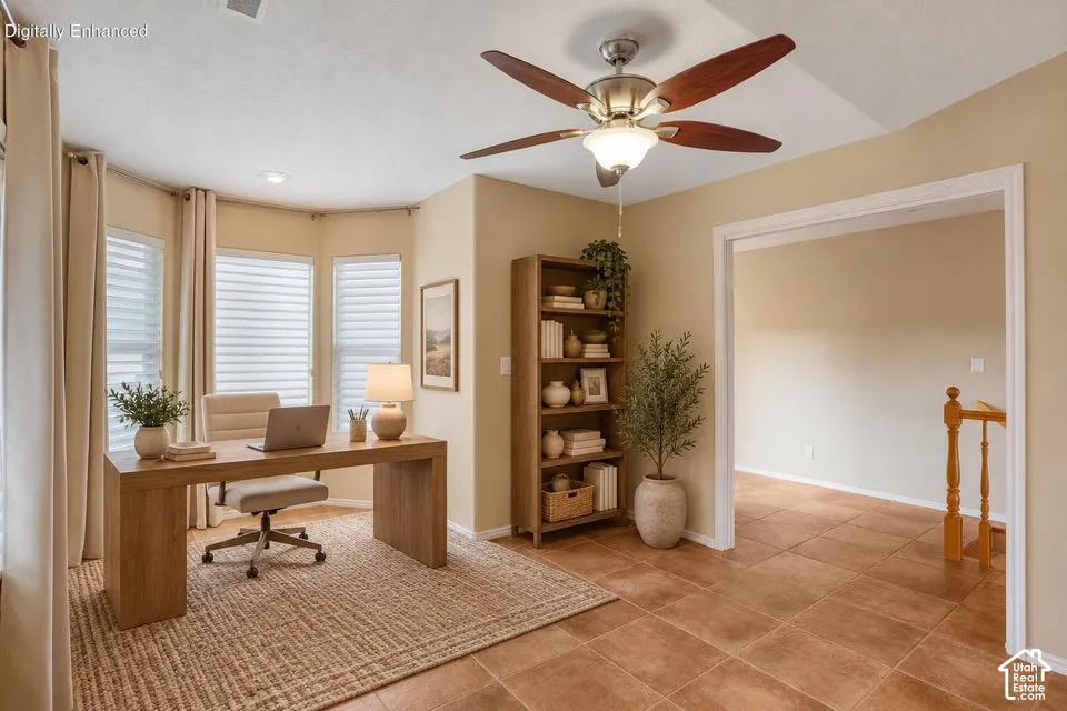 Bay window featuring multi-pane glass, ceramic tile flooring, and a ceiling fan with integrated lighting