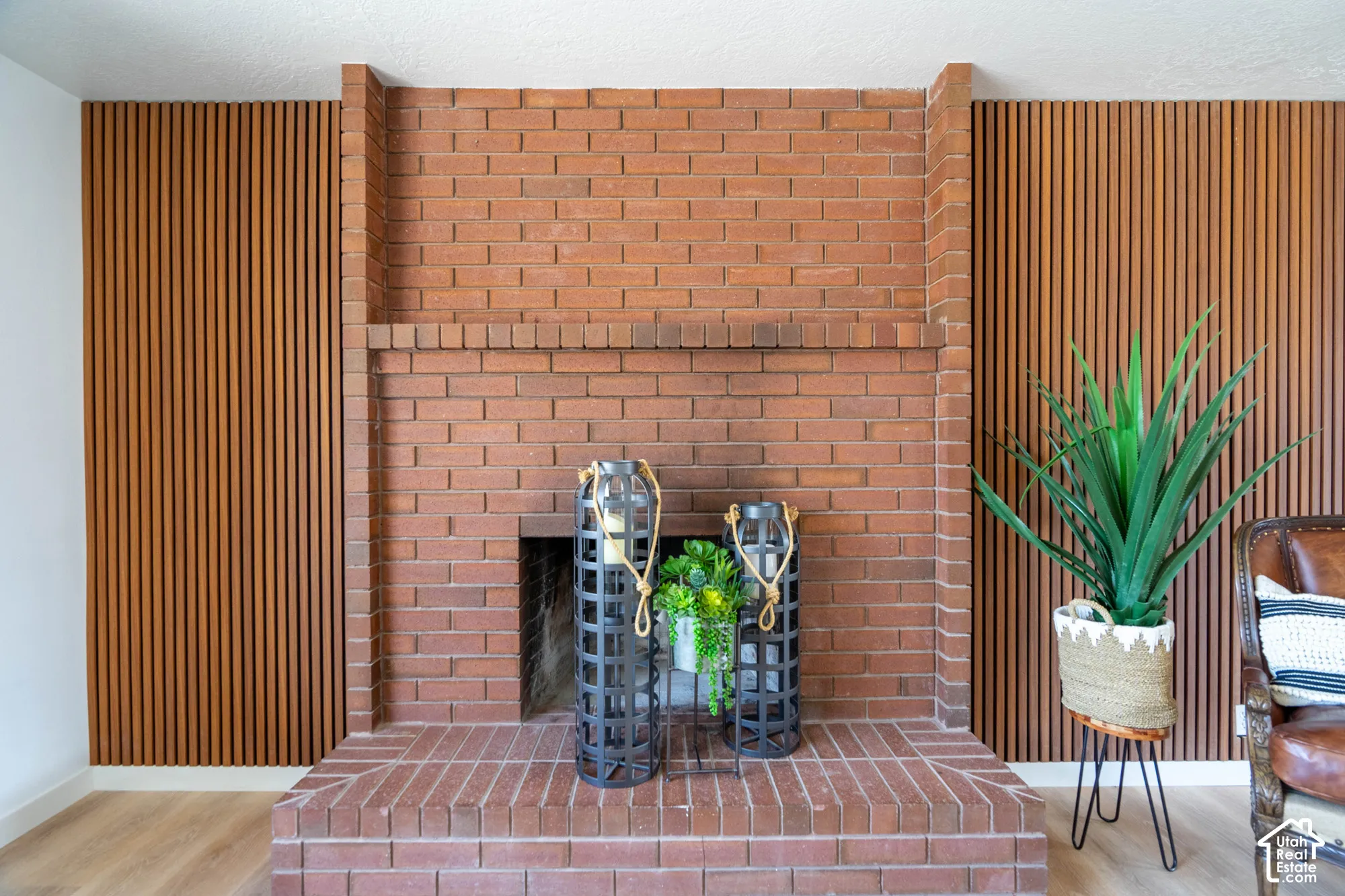 Brick fireplace with a deep firebox and a raised hearth