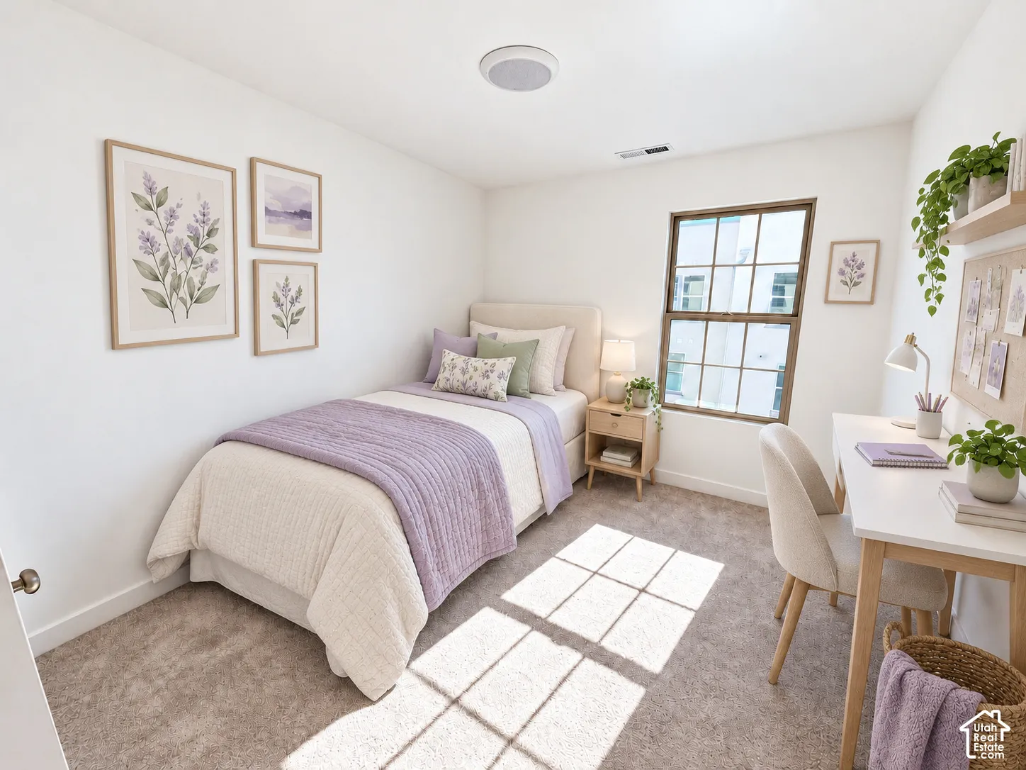Neutral-toned room featuring neutral wall-to-wall carpeting and a multi-pane window with a bronze-finish frame