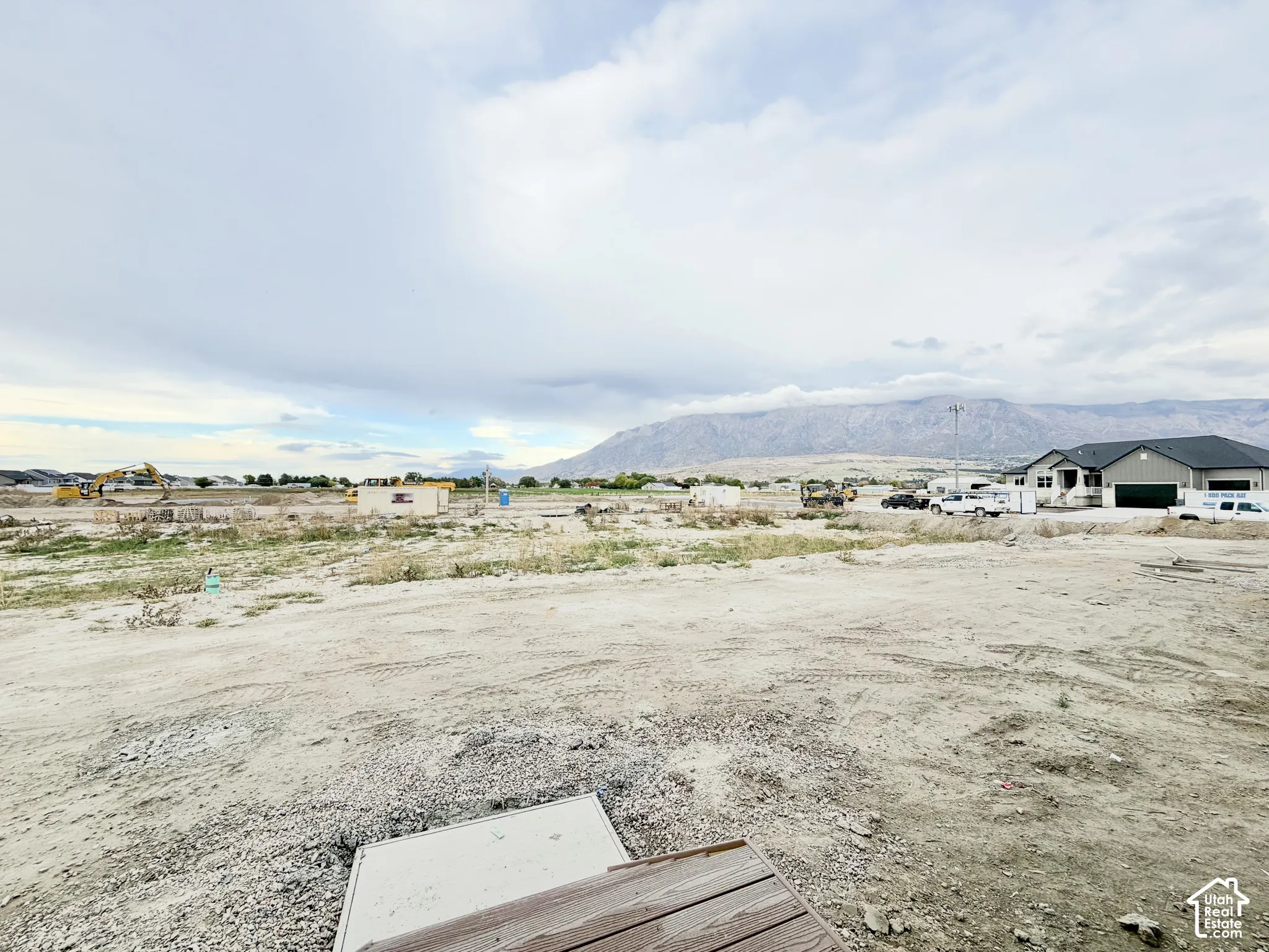 Expansive vacant lot featuring mountain scenery