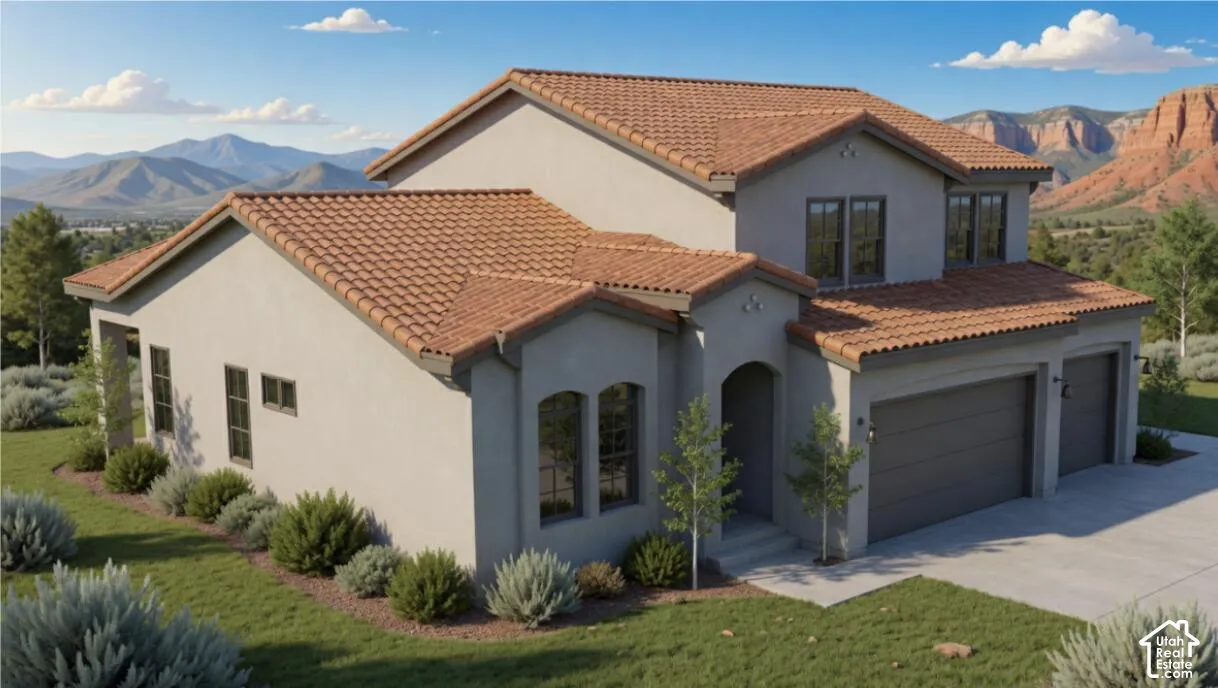 Stucco exterior featuring a clay tile roof, arched windows, and a three-car garage set against a mountain backdrop