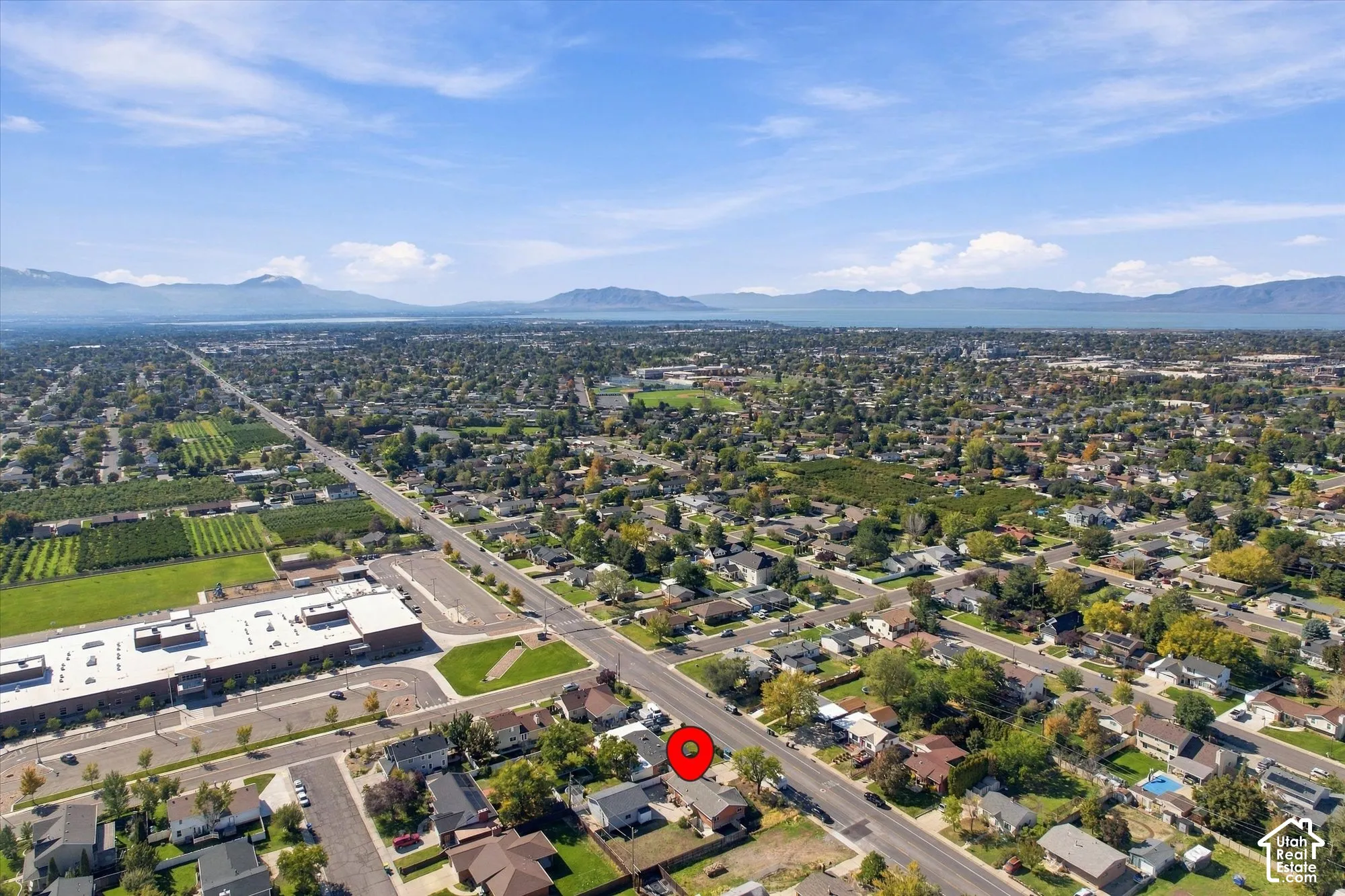 Aerial perspective of property location featuring mountain and lake surroundings