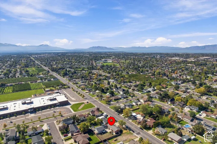 Aerial perspective of property location featuring mountain and lake surroundings