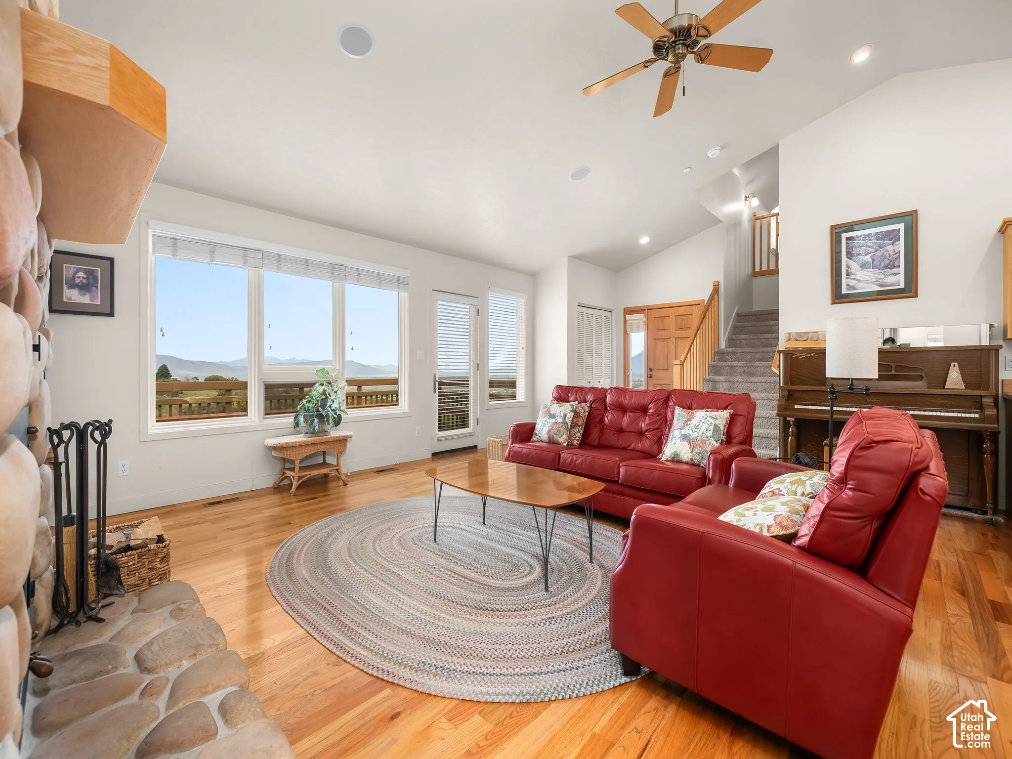 Main living room with windows to valley view.