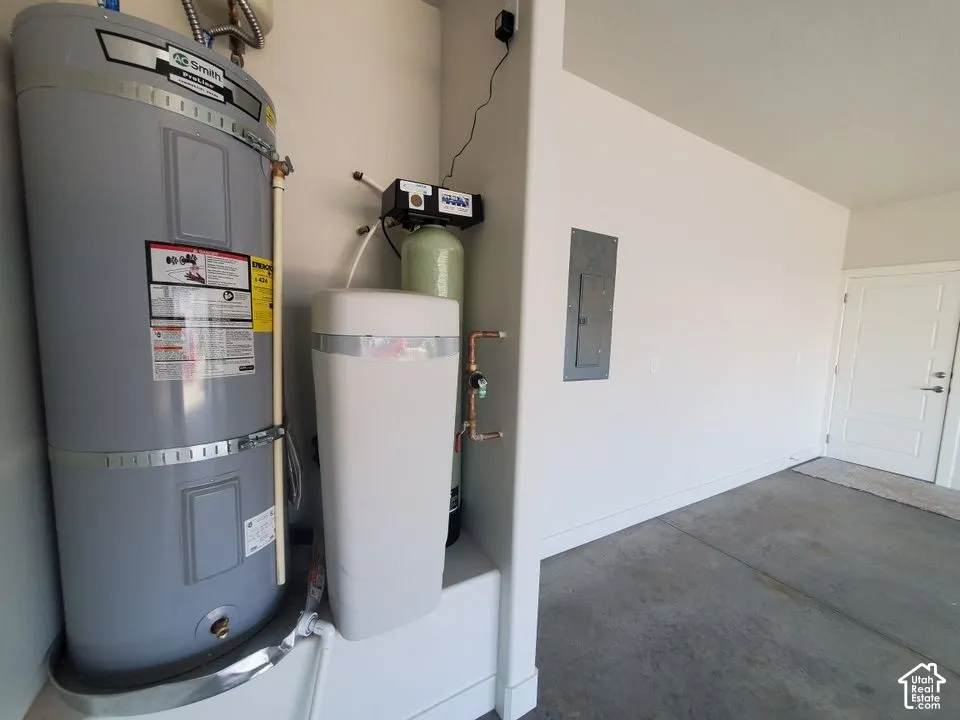 Water heater, installed water softening system, electrical panel, and panel-style entry door