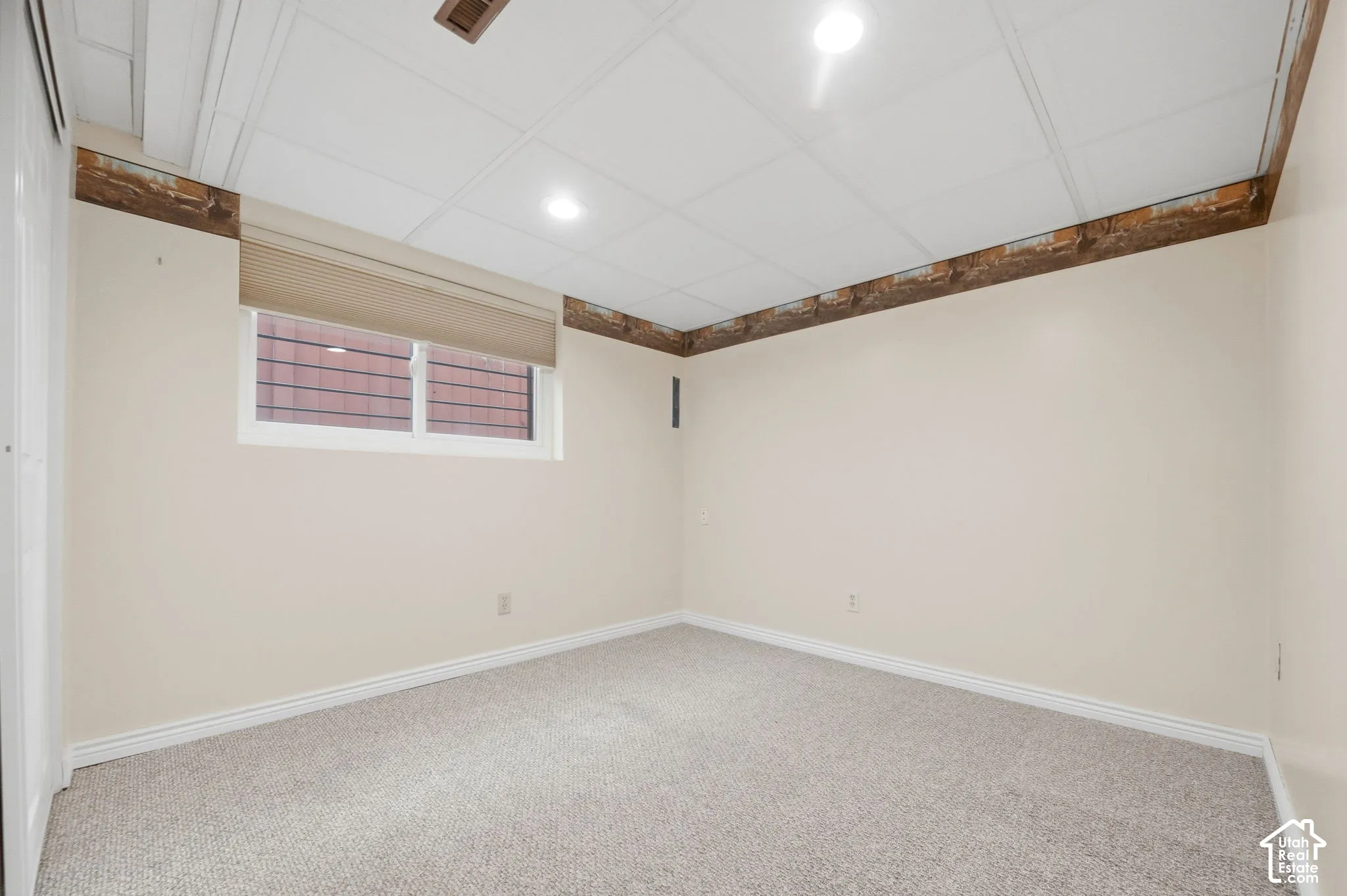 Room featuring neutral wall-to-wall carpeting, and recessed lighting