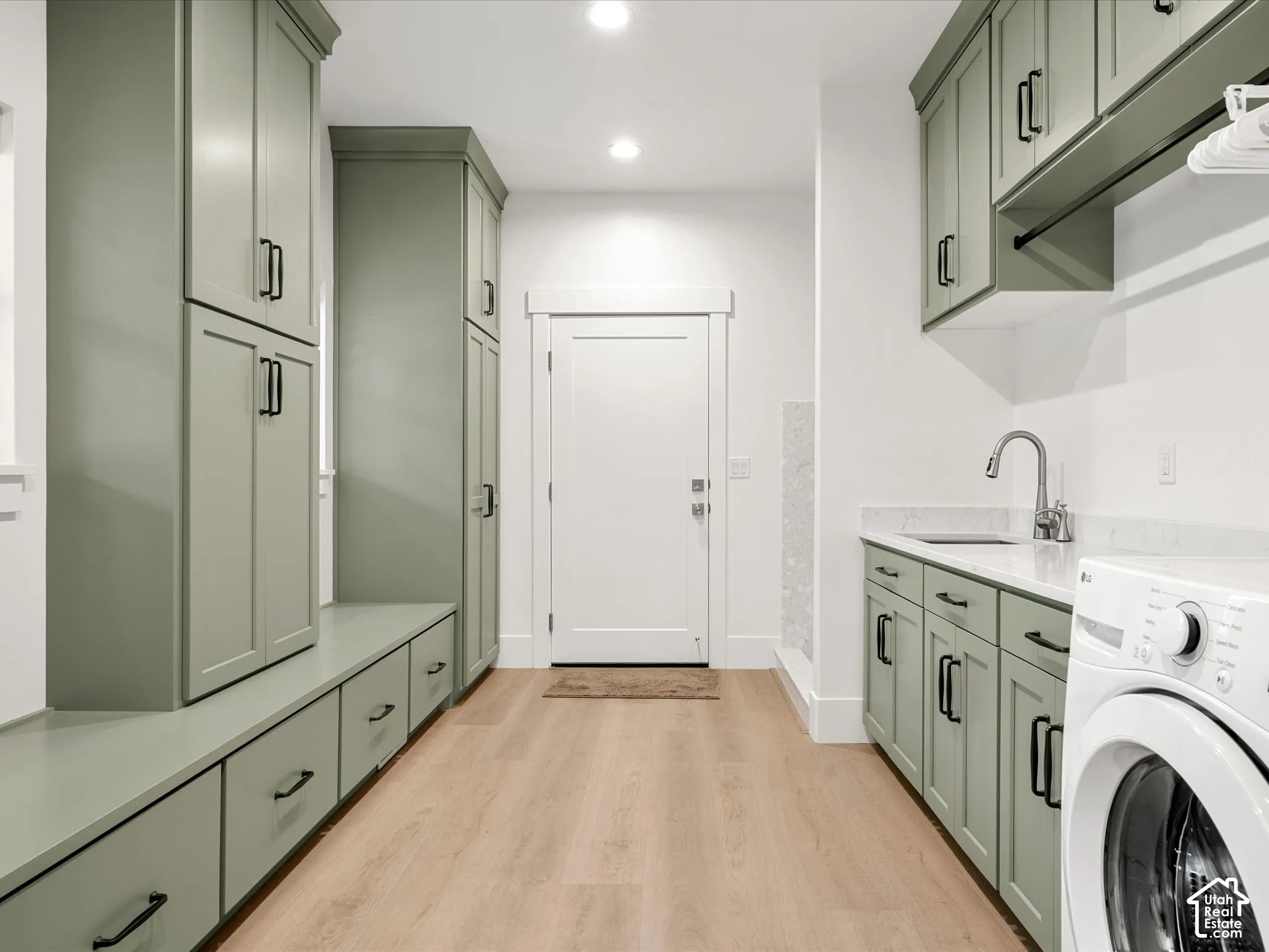 laundry room with dog wash station