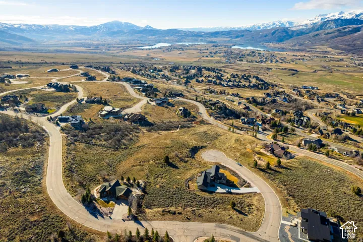 Aerial overview of property's location featuring mountains