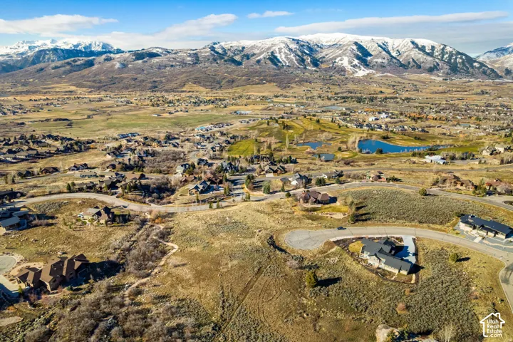 Aerial view of residential area with a water and mountain view