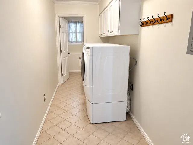 Large laundry area featuring extra storage space
