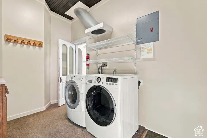 Laundry room with full-size washer and dryer and fun laundry shoot from upstairs!