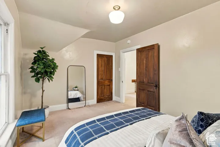 Bedroom showing closet and entrance to the hallway.