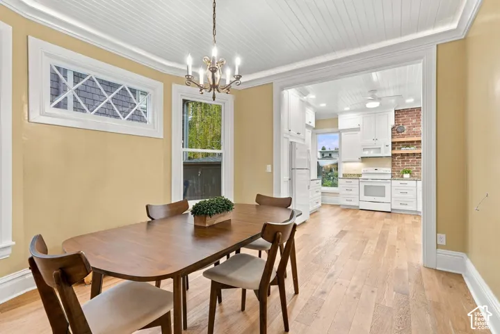 Spacious dining room with beautiful windows just off the large kitchen area.