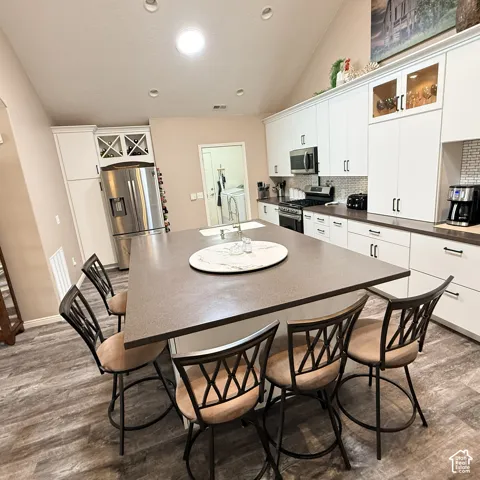 Kitchen leads to laundry room/garage entry