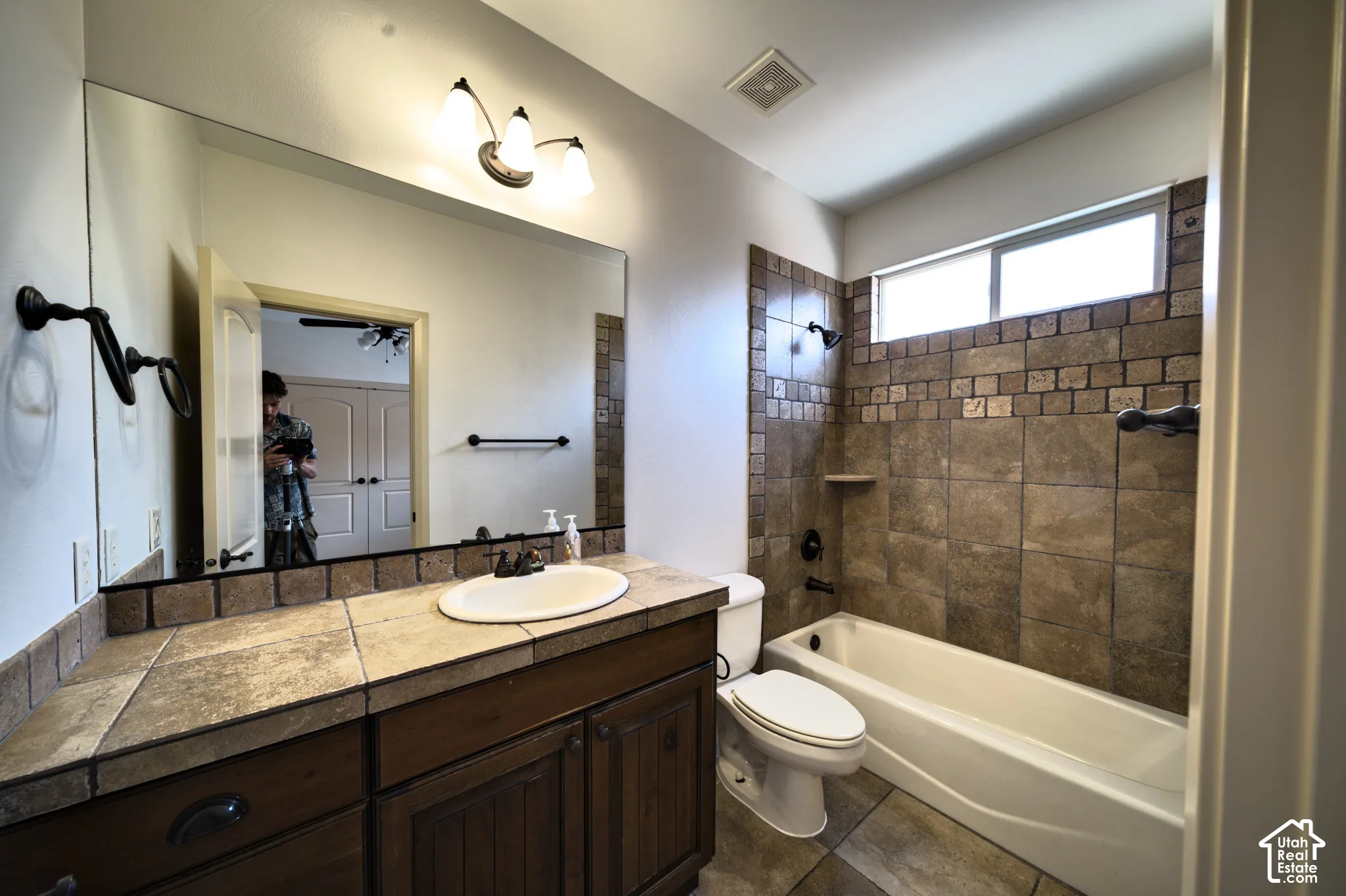 Bathroom for the second main-floor bedroom, with a tub and shower.
