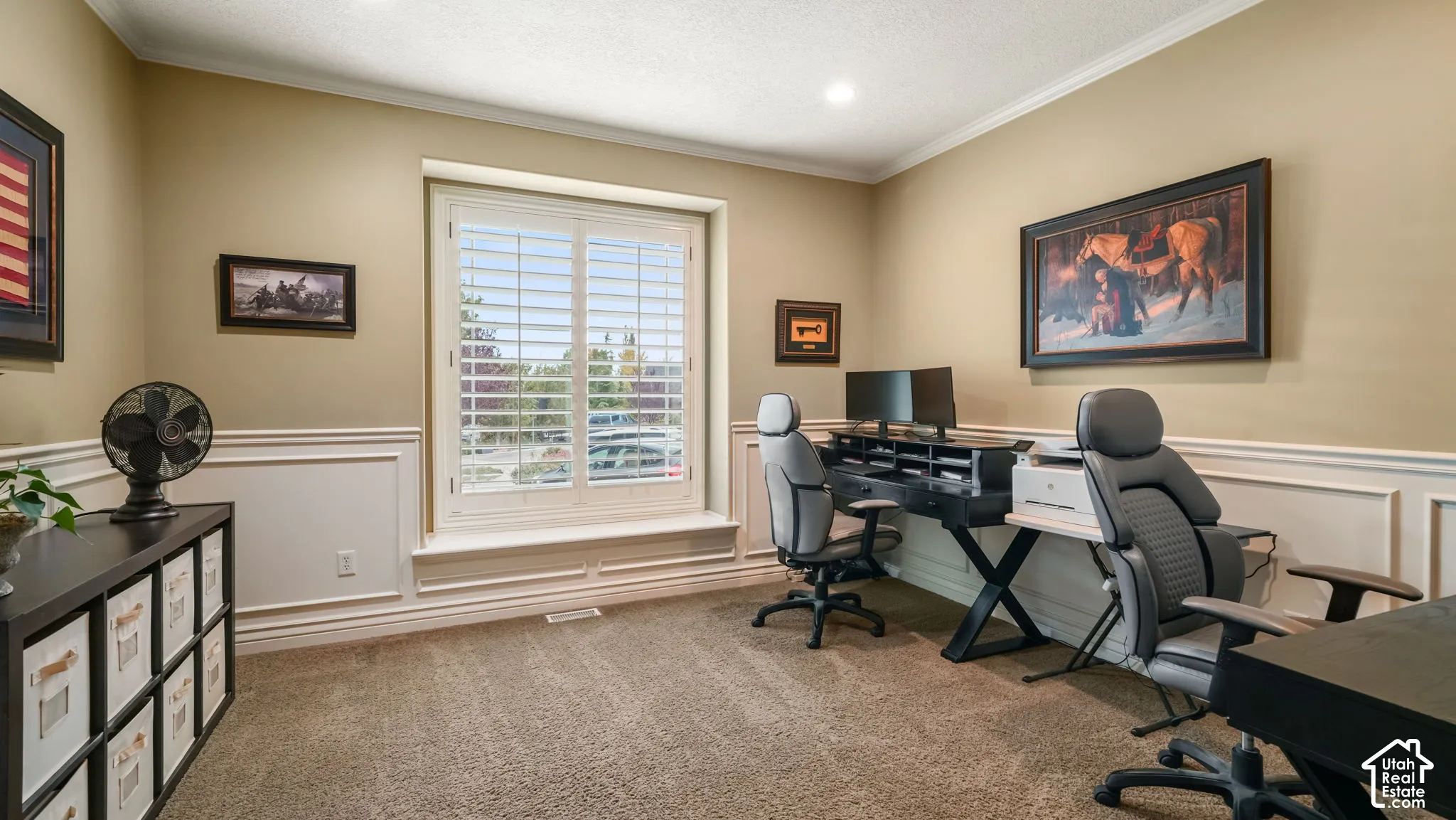 Room featuring wainscoting, wall-to-wall carpeting, recessed lighting, and a large window with interior plantation shutters