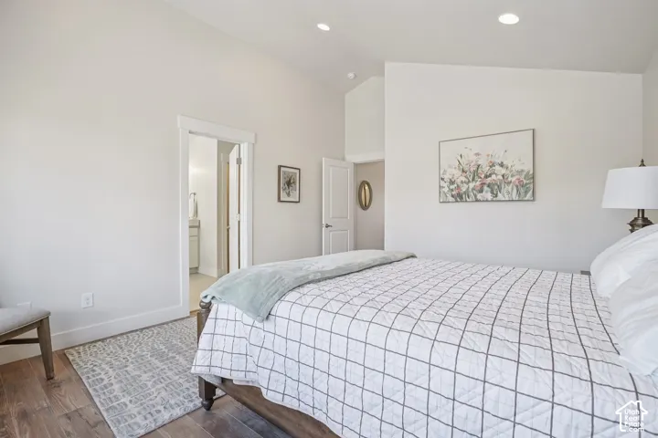 Vaulted ceilings, wood-finish flooring, and recessed lighting