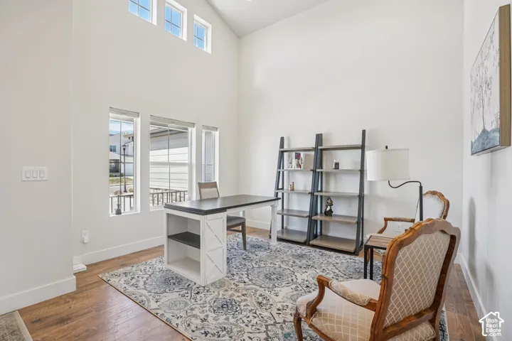 Vaulted ceilings, expansive windows, clerestory windows, and wood-finish flooring
