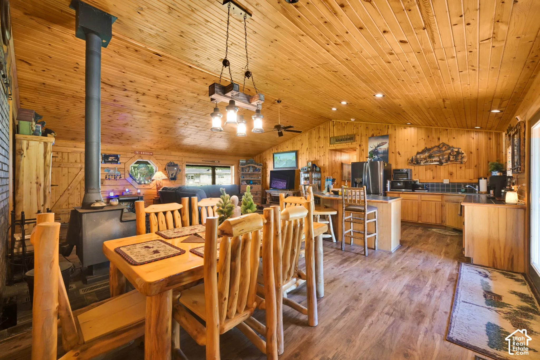 Dining room off of kitchen, next to wood burning stove