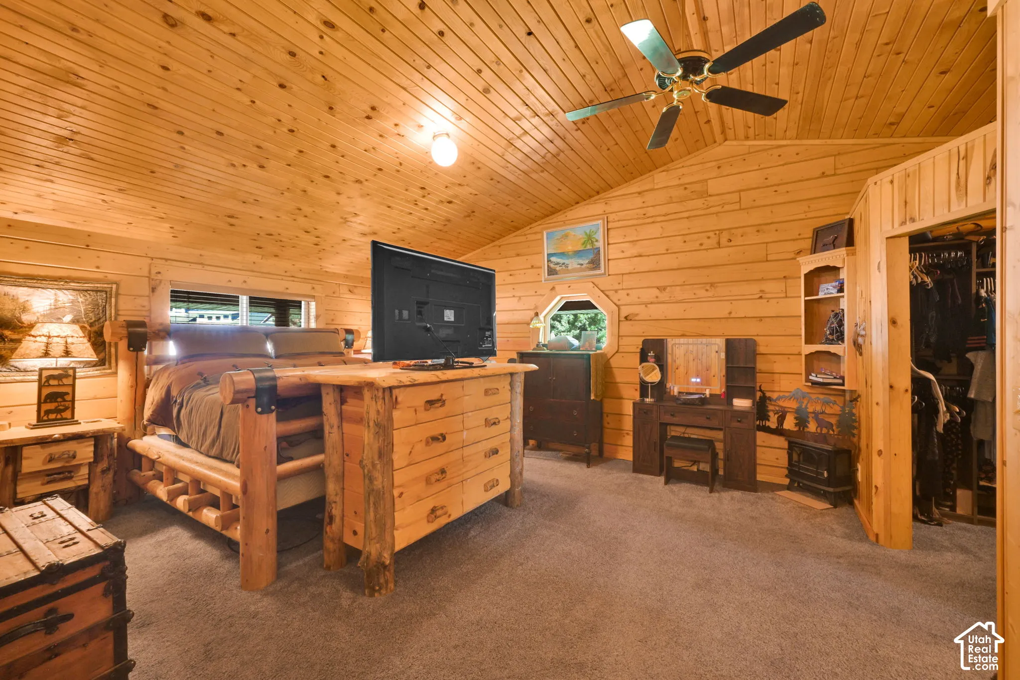 Primary bedroom with bathroom attached, gorgeous wood.