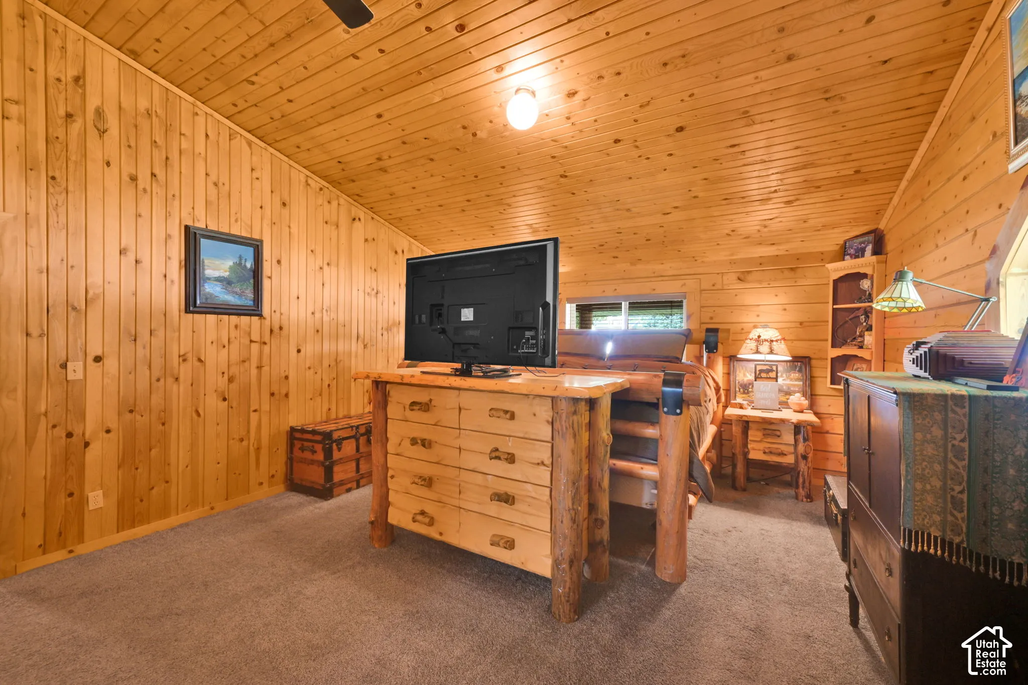 Primary bedroom with bathroom attached, gorgeous wood.