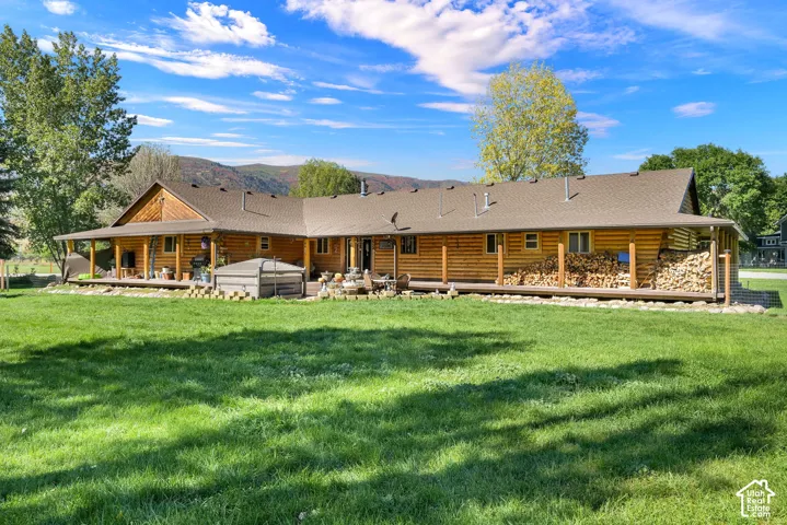 Back view of the cabin and bull frog spa