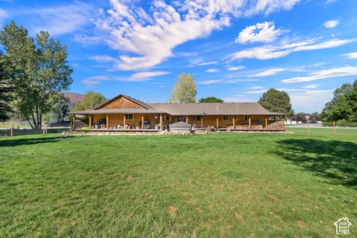 Back view of the cabin and bull frog spa