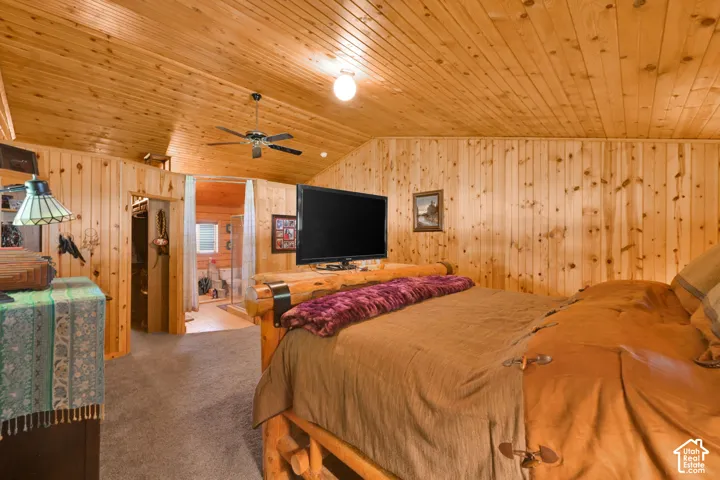 Primary bedroom with bathroom attached, gorgeous wood.