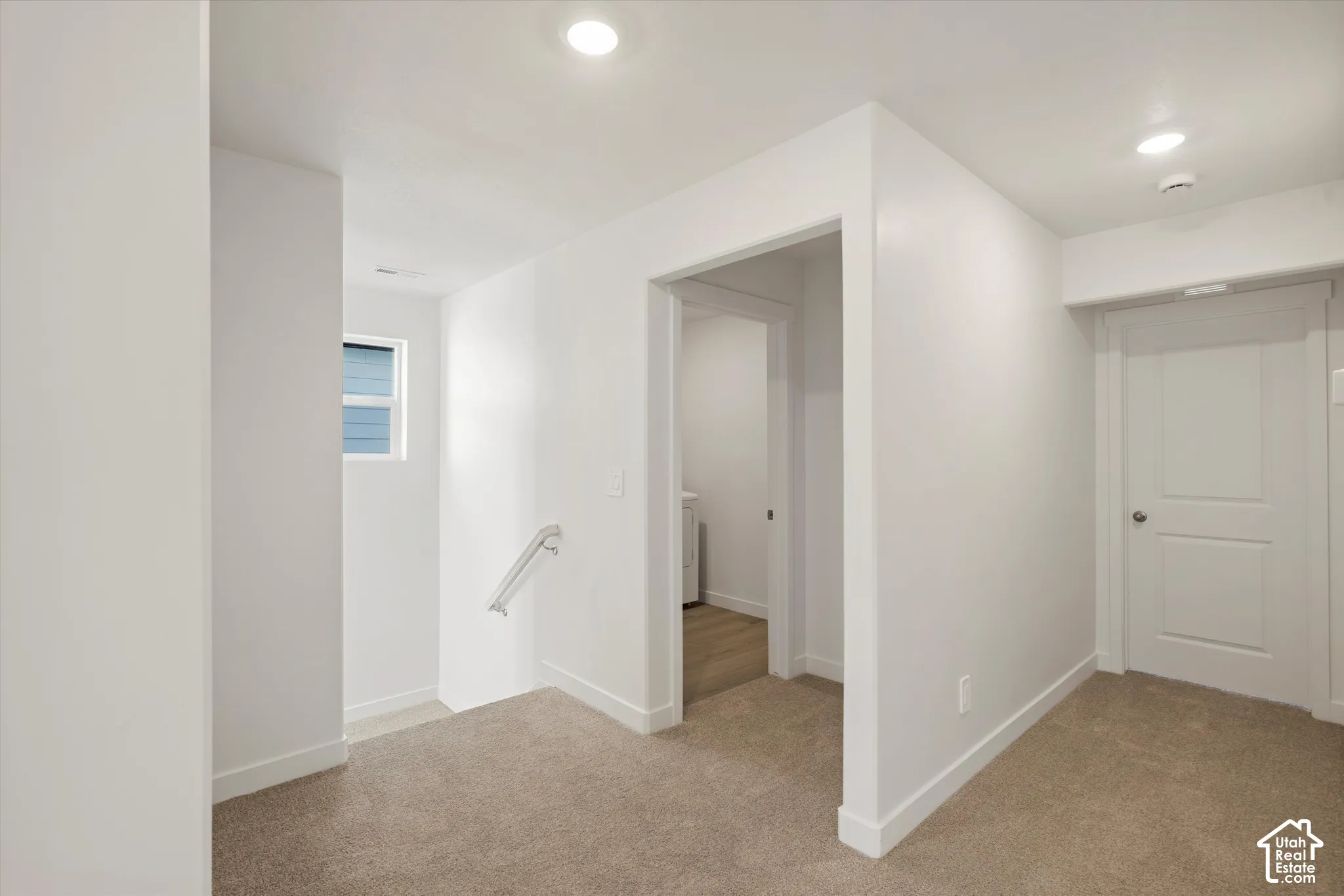 **Disclaimer** Interior package & colors may vary.  Neutral wall color palette, carpeted flooring, recessed lighting, and white interior doors