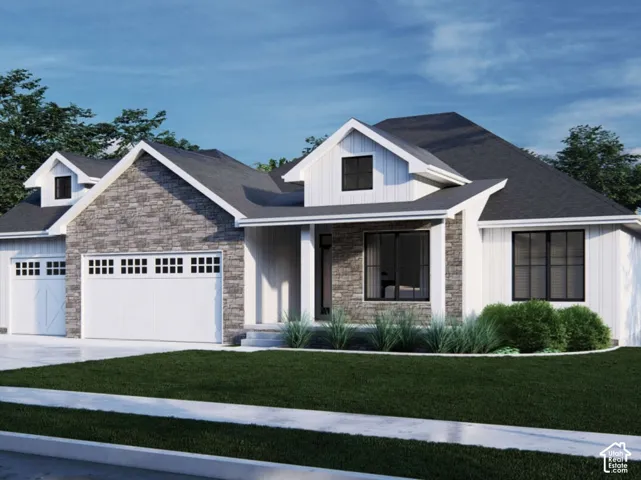Modern exterior featuring vertical siding, stone masonry accents, a pitched roofline, gabled dormers, and an attached multi-car garage