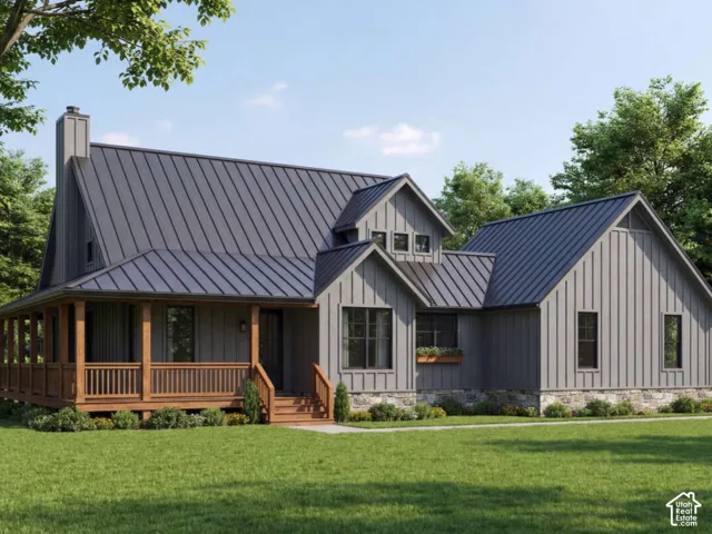 Modern farmhouse exterior featuring vertical board-and-batten siding, a metal roof, stacked stone foundation, and a wraparound covered timber porch