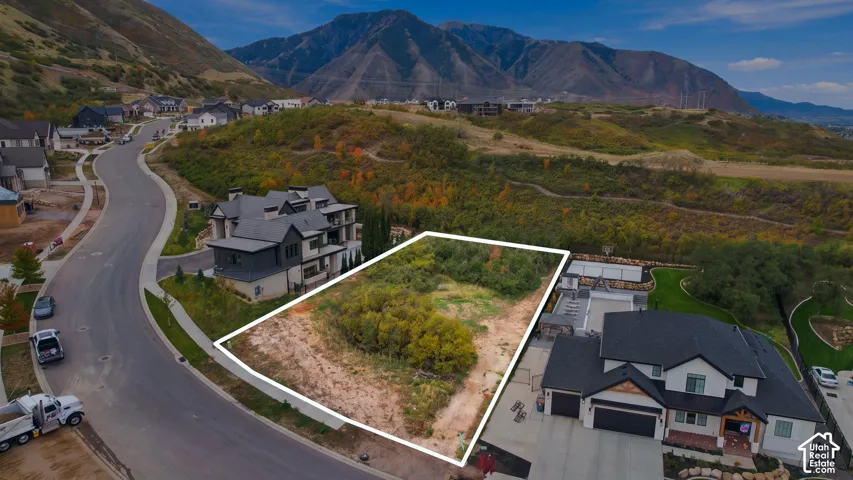Vacant parcel featuring native vegetation, topographical variation, and proximity to mountain terrain