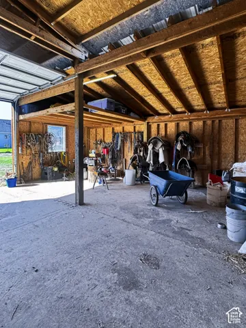 Enclosed barn with electricity, water, and storage.