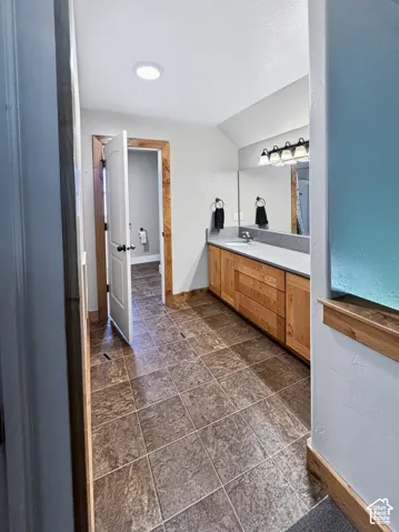 Second floor vanity area outside the full bathroom .