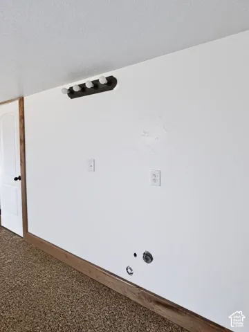 Basement kitchenette rough-in: plumbing and electrical stubbed in.