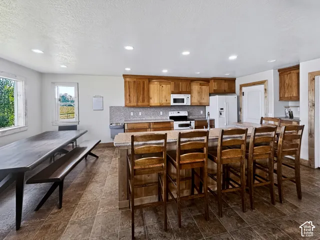 Extra long kitchen island and drinking fountain.