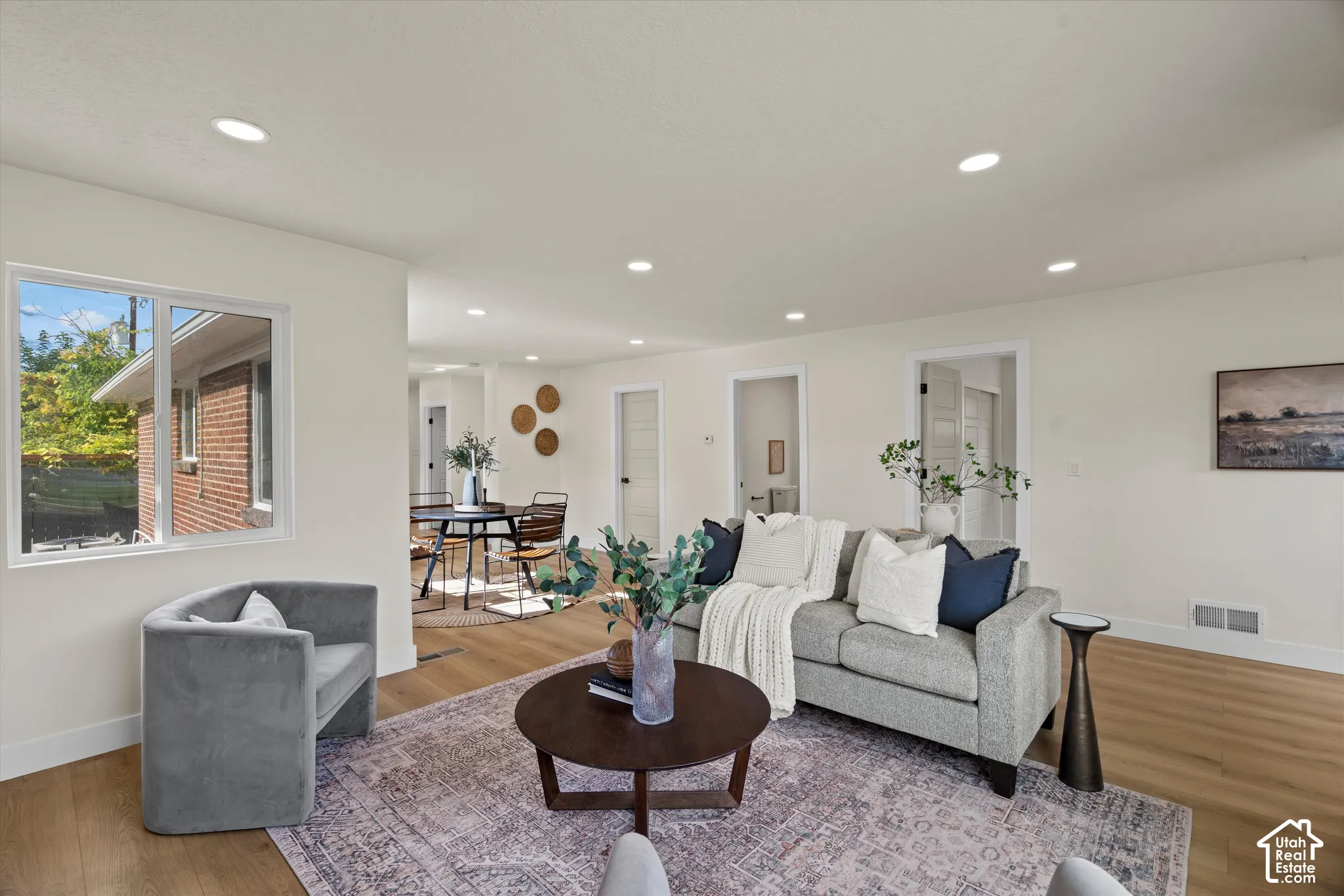 Interior space featuring wood-finish flooring, recessed lighting, and neutral wall paint